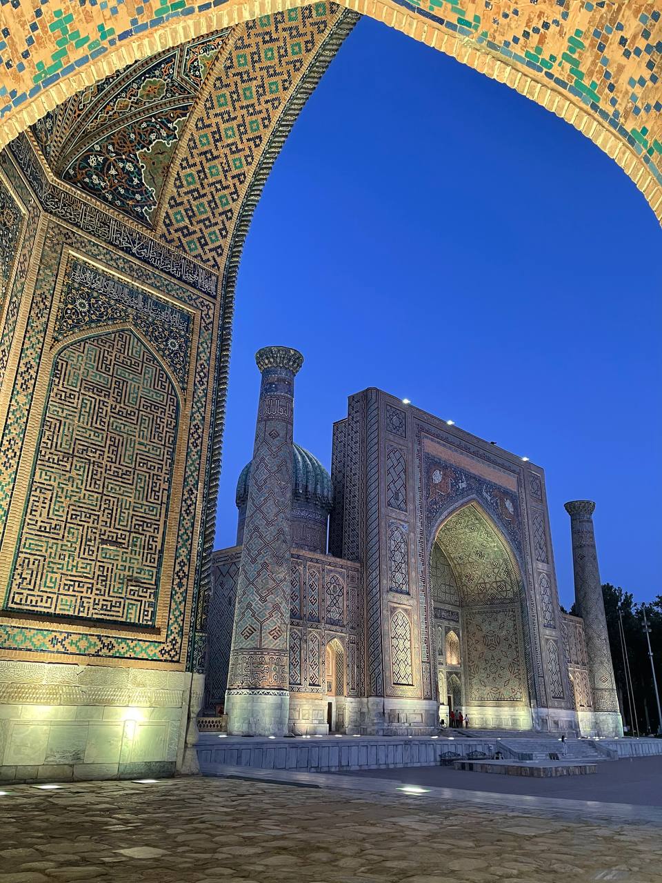 Travelers on the Golden Silk Road of Central Asia, experiencing the rich cultural heritage and stunning landscapes during a 15-Day Grand Tour